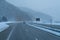 Highway in wintertime or Winter road in a blizzard