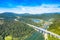 Highways through mountains of the Gorski Kotar in Croatia, bridge over beautiful lake Bajer in Fuzine