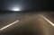 Higway at night with fog and poor visibility