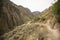Hike through the Colca Canyon following the route from Cabanaconde to the Oasis.