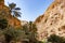 Hike through narrow valley of Wadi Shab in Tiwi near Mascat in Oman