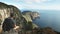 A hiker admires the view of cape raoul in tasmania