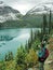 Hiker admiring Lake O\'Hara, Yoho National Park, Canada