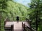 Hiker Admiring View of Catskill Mountains From Overlook