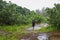 A hiker along Kauai\'s Old Club Med beach trail.