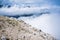 Hiker approaching the top of Mala Mojstrovka