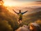 Hiker with arms up standing on the top of the mountain