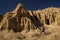 A hiker in the Artist`s Palette landmark place in Death Valley National Park, Geology, sand