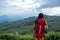 Hiker asian woman feeling victorious facing on the mountain, Thailand.