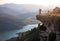 Hiker with baby relaxing on cliff