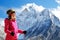 Hiker with backpacks in Himalayas mountain, Nepal. Active sport concept