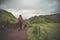 Hiker and Border Collie Exploring Fairy Glen on the Isle of Skye