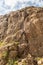 Hiker on the bottom chain ladders to top of Amphitheatre