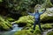 Hiker boy by the river