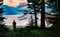 Hiker camping next to Banff Lake in Canadian Rockies