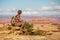 Hiker in Canyonlands National park, needles in the sky, in Utah, USA