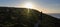 Hiker on the cliff during the sunset