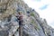 Hiker climbing in the mountain of Alps, Europe