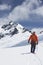 Hiker Connected To Safety Line In Snowy Mountains