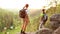 Hiker couple at sunset in beautiful landscape.