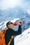 Hiker drinking water in mountains