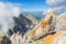 Hiker at Ellmauer Halt, Wilder Kaiser mountains of Austria - close to Gruttenhuette, Going, Tyrol, Austria - Hiking in the Alps of