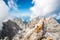 Hiker at Ellmauer Halt, Wilder Kaiser mountains of Austria - close to Gruttenhuette, Going, Tyrol, Austria - Hiking in the Alps of