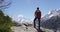 Hiker enjoying view of mountains and Mount Cook in New Zealand