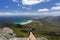 Hiker enjoying the view from the summit of Mount Oberon at Wilsons Promontory