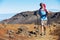 Hiker enjoying walk on amazing mountain trail