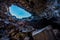 Hiker exploring Indian Tunnel Cave