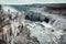 Hiker at gigantic Dettifoss waterfall in Iceland