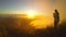 Hiker girl taking picture of sunrise from peak of Batur volcano. GoPro HD. Bali, Indonesia.