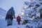 Hiker girls on a deep snowy trail