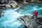 Hiker and the Glacial River