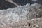 Hiker on glacier moraine