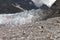 Hiker on glacier moraine