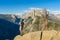 Hiker at the Glacier Point with View to Yosemite Valley and Half Dome in the Yosemite National Park, California, USA