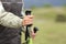 Hiker hands holding a hiking pole while walking