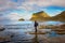 Hiker at Haukland beach on Lofoten islands, Norway