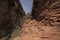 Hiker Heading into a Desert Canyon