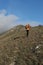 Hiker heading to the top of the mountain, mount Strega, Apennines, Marche, Italy