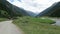 Hiker at Krimml Achental valley at Krimml waterfalls in Salzburger land. austria