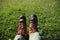 Hiker legs hiking in grassland mountains