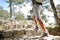 Hiker legs walking on stairs