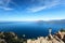 Hiker looking at Calanques de Piana in Corsica, France