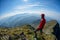 Hiker looking over the mountain ridges