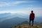 Hiker looking over the mountain ridges