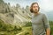 Hiker man - Portrait - behind huge mountains of the Dolomites
