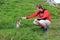 Hiker in the mountains with a curious marmot